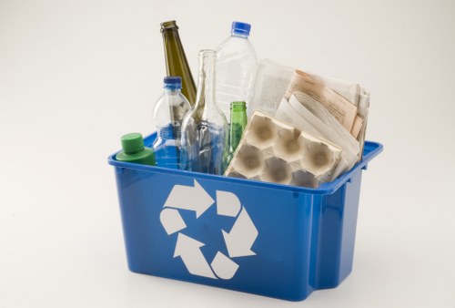 Residents arranging furniture for disposal in Havering