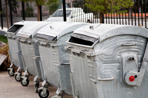 Business professionals discussing waste removal strategies