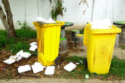 Waste collection trucks in action in Havering