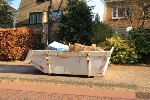 Customer consulting with garage clearance experts